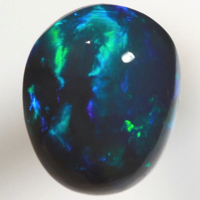 SOLID BLACK OPAL Bright turquoise and blue rolling flashes